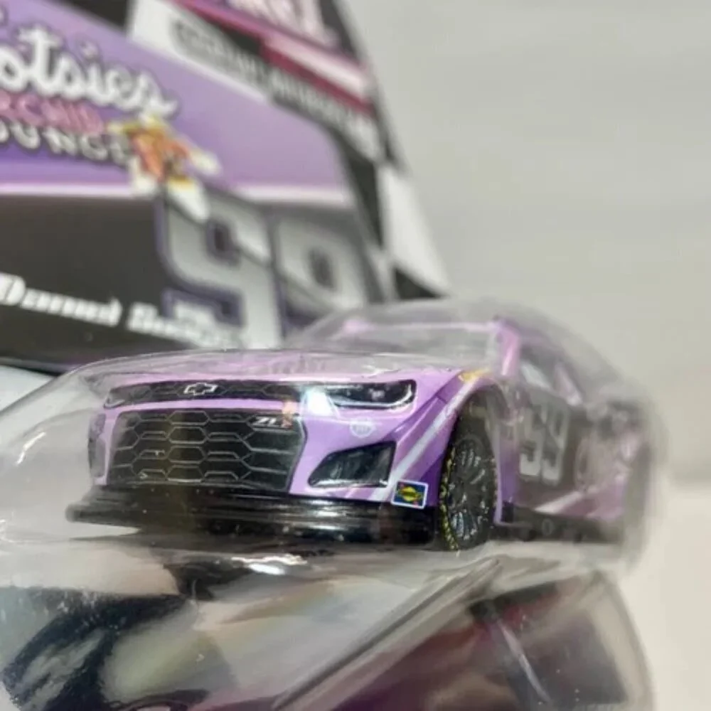 Nascar Authentics Tootsies Daniel Sua'rez 99 Wave 06 SKU-27661 Race Car NIP 2023
